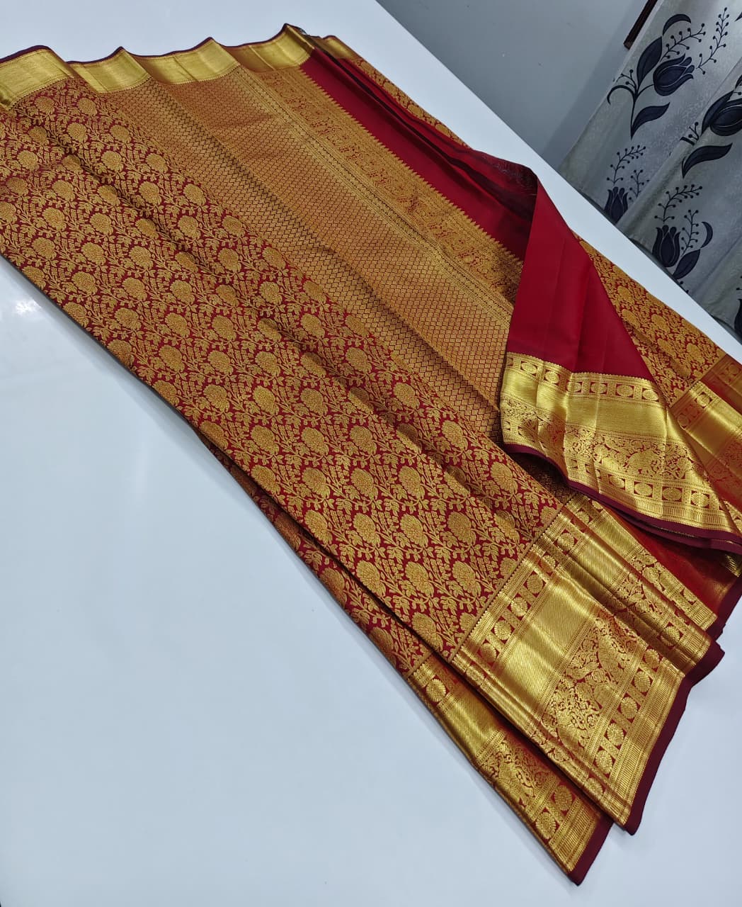 Rani Pink Kanjivaram Silk Saree with a Broad Golden Zari Border